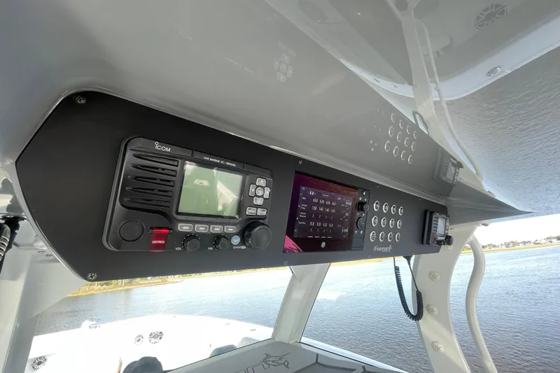  Yacht Photos Pics Control panel of a 2022 Freeman 47 boat with navigation and communication equipment.