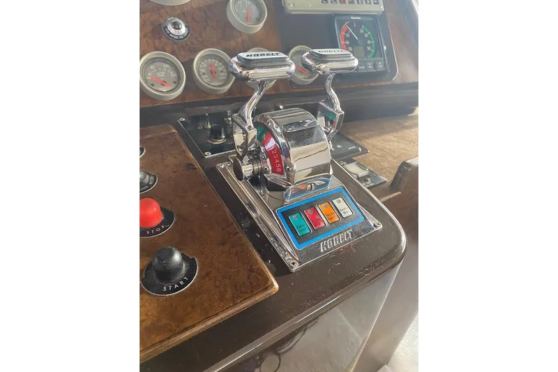  Yacht Photos Pics Control panel of a 1990 Riva Corsaro 20 boat with gauges and switches.