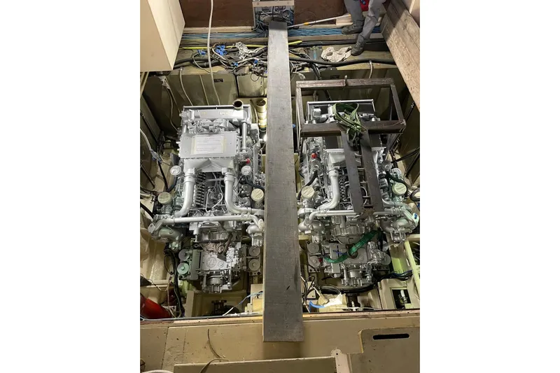  Yacht Photos Pics Engine compartment of a 1990 Riva Corsaro 20 boat, showcasing dual engines.