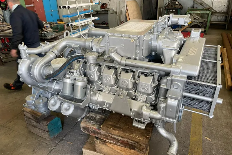  Yacht Photos Pics 1990 Riva Corsaro 20 engine in workshop, detailed view of mechanical components.