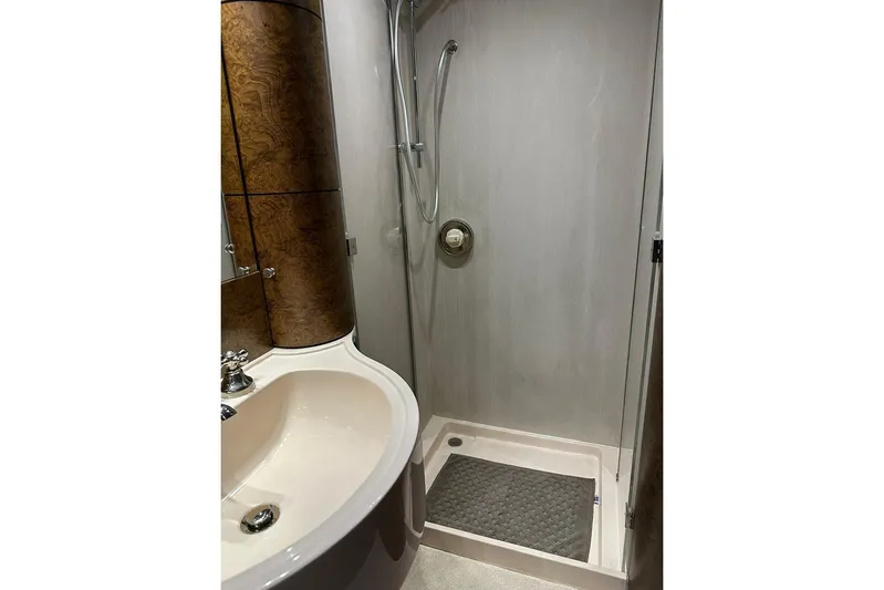  Yacht Photos Pics Bathroom interior of 1990 Riva Corsaro 20 yacht with shower and sink.