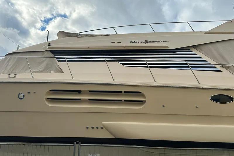  Yacht Photos Pics 1990 Riva Corsaro 20 yacht side view with sleek design and elegant detailing.