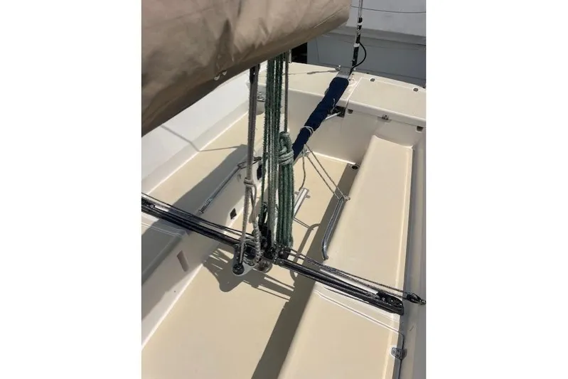  Yacht Photos Pics 2005 J Boats J/100 sailboat deck with rigging and ropes in sunlight.