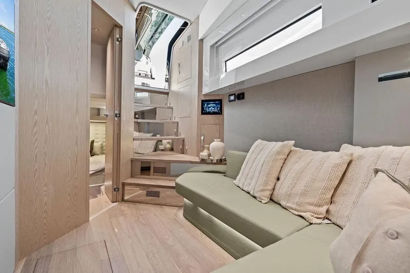  Yacht Photos Pics Luxurious interior of 2026 SACS Rebel 55 yacht with modern design and comfortable seating.