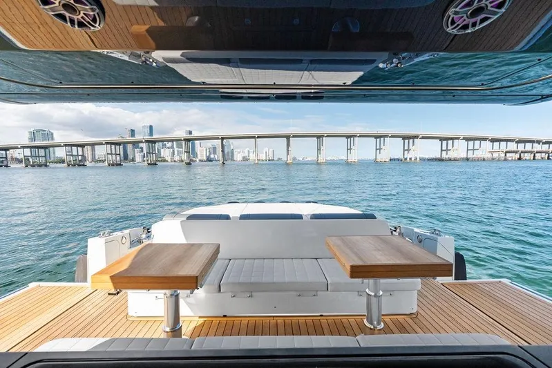  Yacht Photos Pics Luxurious 2026 SACS Rebel 55 yacht interior with city skyline and bridge view.
