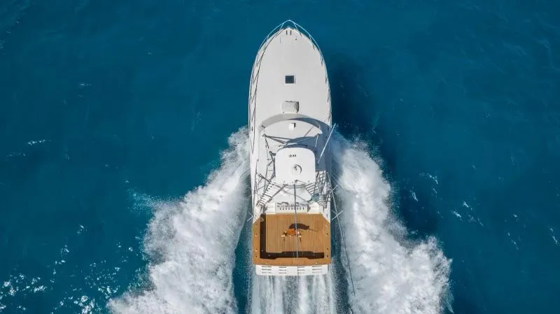 Sea Ghost Yacht Photos Pics Aerial view of 2008 Spencer Custom Carolina Express yacht cruising in blue ocean.