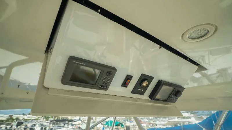 Sea Ghost Yacht Photos Pics 2008 Spencer Custom Carolina Express boat dashboard with navigation and control instruments.