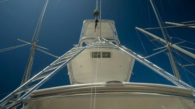 Sea Ghost Yacht Photos Pics 2008 Spencer Custom Carolina Express boat tower against clear blue sky.