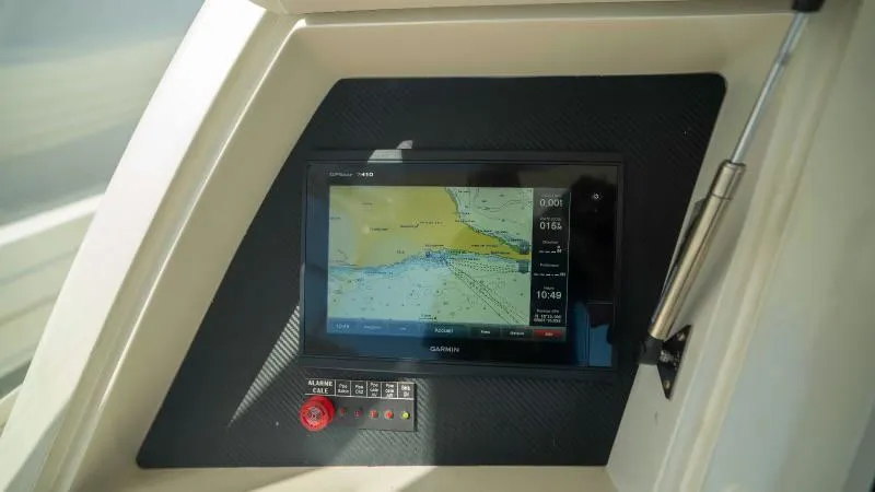 Sea Ghost Yacht Photos Pics Navigation system on 2008 Spencer Custom Carolina Express boat dashboard.