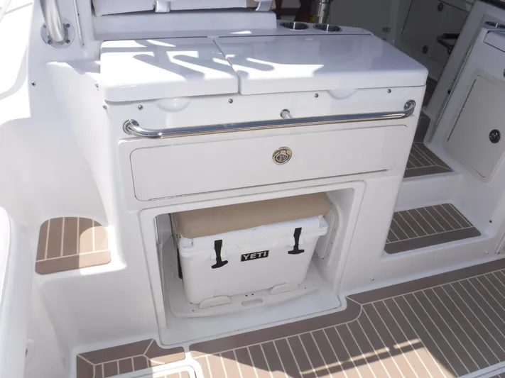 Yacht Photos Pics 2008 Boston Whaler 345 Conquest interior with Yeti cooler storage.