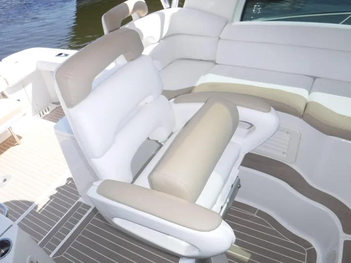  Yacht Photos Pics Luxury seating on 2008 Boston Whaler 345 Conquest boat, featuring beige and white upholstery.