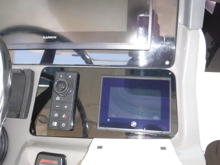  Yacht Photos Pics Control panel of a 2008 Boston Whaler 345 Conquest with Garmin display.