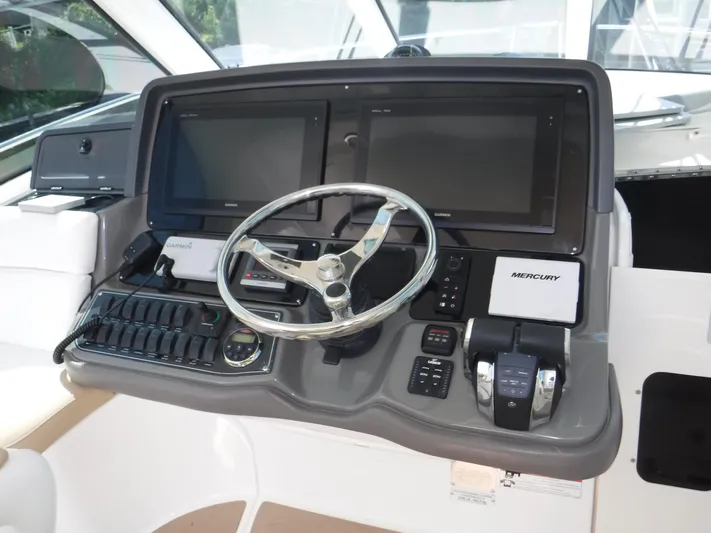  Yacht Photos Pics Helm of 2008 Boston Whaler 345 Conquest with dual screens and controls.
