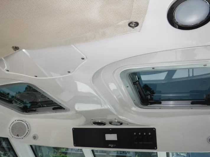  Yacht Photos Pics Ceiling view of 2008 Boston Whaler 345 Conquest boat with skylights and speaker.