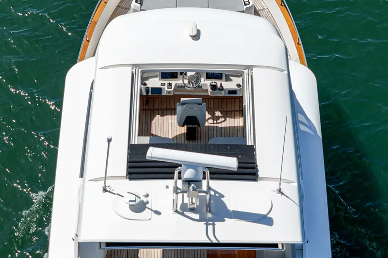 Yacht Photos Pics 2024 Absolute 58 Navetta yacht, aerial view of helm station on open sea.