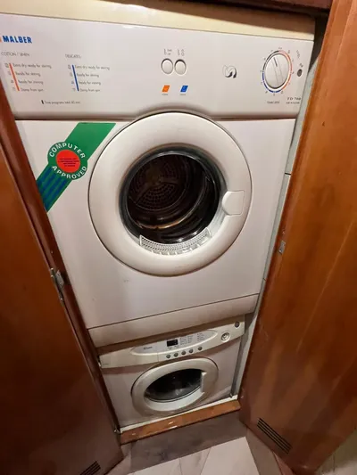 Play Pen Yacht Photos Pics Stacked washer and dryer in a Bertram 510 Convertible yacht, 2001 model.