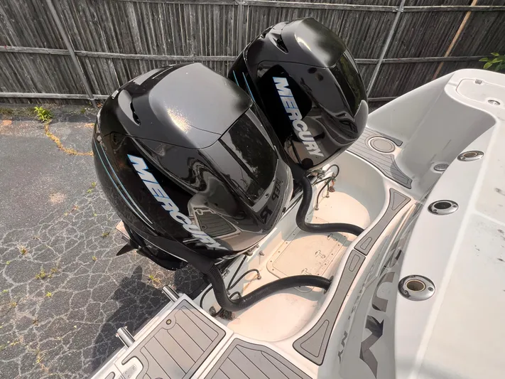  Yacht Photos Pics Twin Mercury outboard engines on a 2005 Boston Whaler 305 Conquest boat.