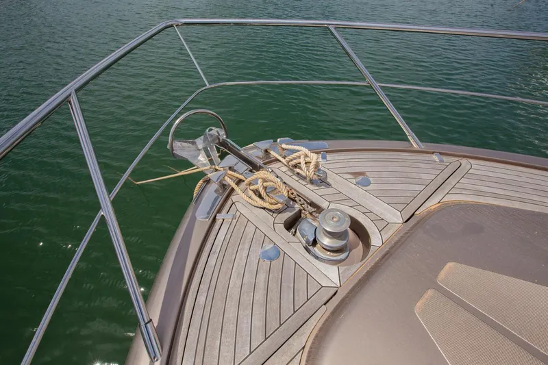  Yacht Photos Pics Bow of 2009 Riva 52 Rivale yacht with anchor and ropes.