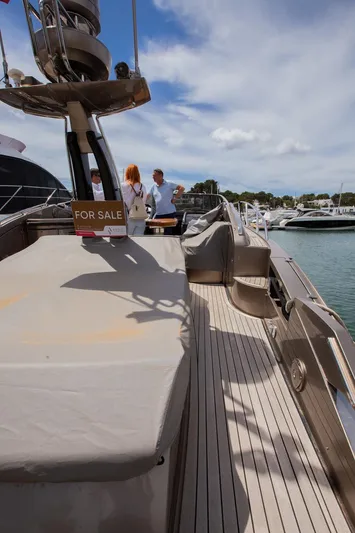  Yacht Photos Pics 2009 Riva 52 Rivale yacht for sale, docked with people onboard.