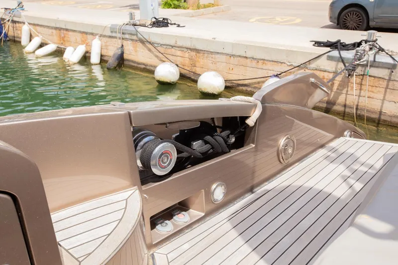  Yacht Photos Pics 2009 Riva 52 Rivale yacht docked, showing deck details and mooring equipment.