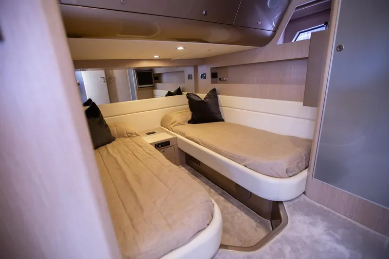  Yacht Photos Pics Luxurious cabin interior of 2009 Riva 52 Rivale yacht with twin beds.