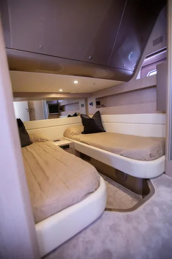  Yacht Photos Pics Luxurious interior of 2009 Riva 52 Rivale yacht with twin beds and modern design.