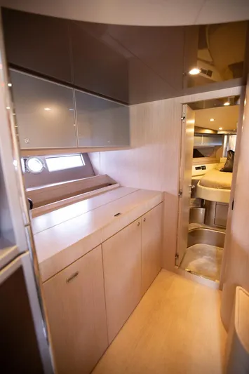  Yacht Photos Pics Interior of 2009 Riva 52 Rivale yacht with modern cabinetry and sleek design.
