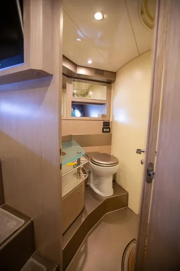  Yacht Photos Pics Luxurious bathroom interior of 2009 Riva 52 Rivale yacht with modern fixtures.