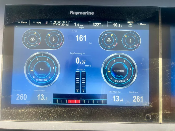  Yacht Photos Pics Raymarine display showing Sea Ray SLX 400 engine data, fuel levels, and navigation metrics.