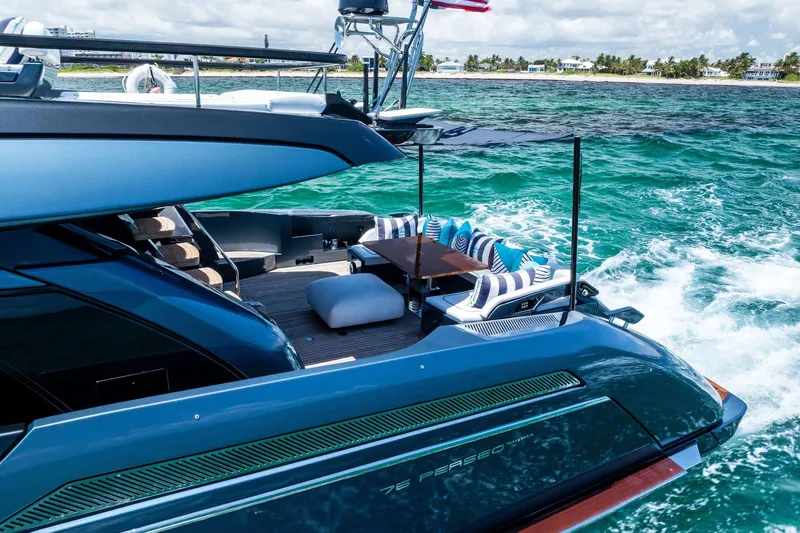 Momentum Yacht Photos Pics Luxury 2024 Riva 76 PERSEO Super yacht cruising on turquoise waters.