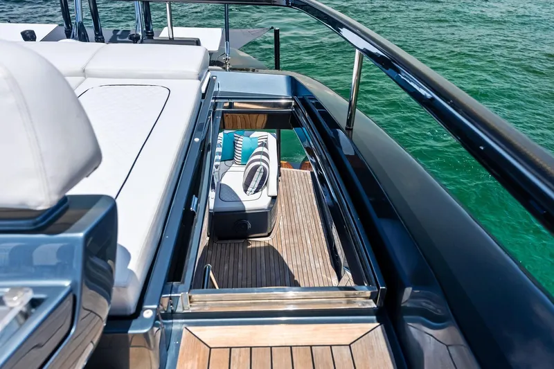 Momentum Yacht Photos Pics Luxurious 2024 Riva 76 PERSEO Super yacht deck with elegant seating and ocean view.