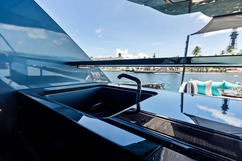 Momentum Yacht Photos Pics Luxury yacht Riva 76 PERSEO Super 2024 with sleek outdoor sink design.