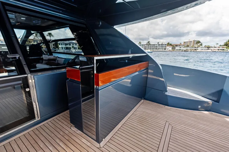 Momentum Yacht Photos Pics 2024 Riva 76 PERSEO Super yacht deck with sleek design and waterfront view.