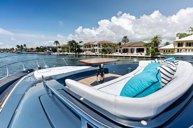 Momentum Yacht Photos Pics Luxurious 2024 Riva 76 PERSEO Super yacht with elegant deck and waterfront view.