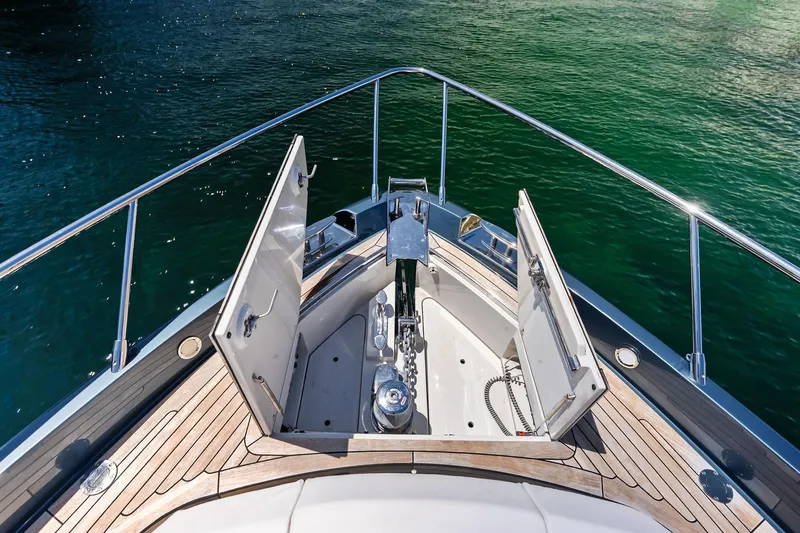 Momentum Yacht Photos Pics Bow view of 2024 Riva 76 PERSEO Super yacht with open anchor compartment.
