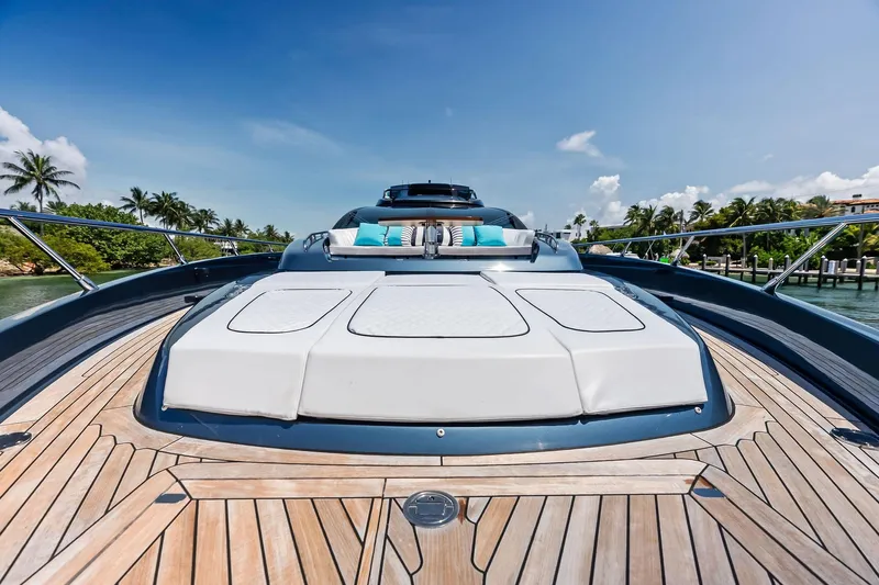 Momentum Yacht Photos Pics 2024 Riva 76 PERSEO Super yacht with luxurious deck and sunbathing area.
