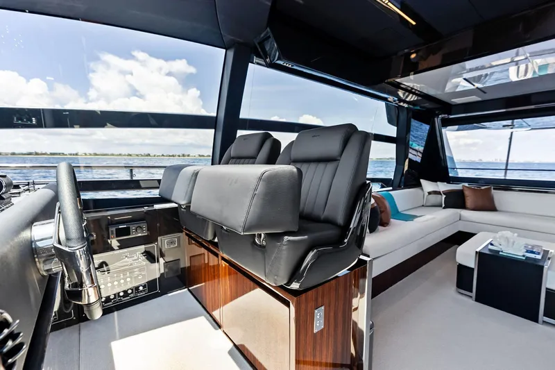 Momentum Yacht Photos Pics Luxurious interior of 2024 Riva 76 PERSEO Super yacht with plush seating and modern design.