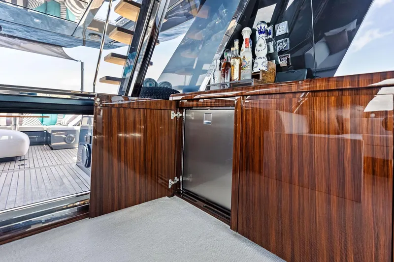 Momentum Yacht Photos Pics Luxurious interior of 2024 Riva 76 PERSEO Super yacht with elegant wood cabinetry.