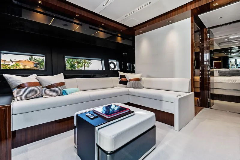 Momentum Yacht Photos Pics Luxurious interior of 2024 Riva 76 PERSEO Super yacht with elegant seating and modern decor.