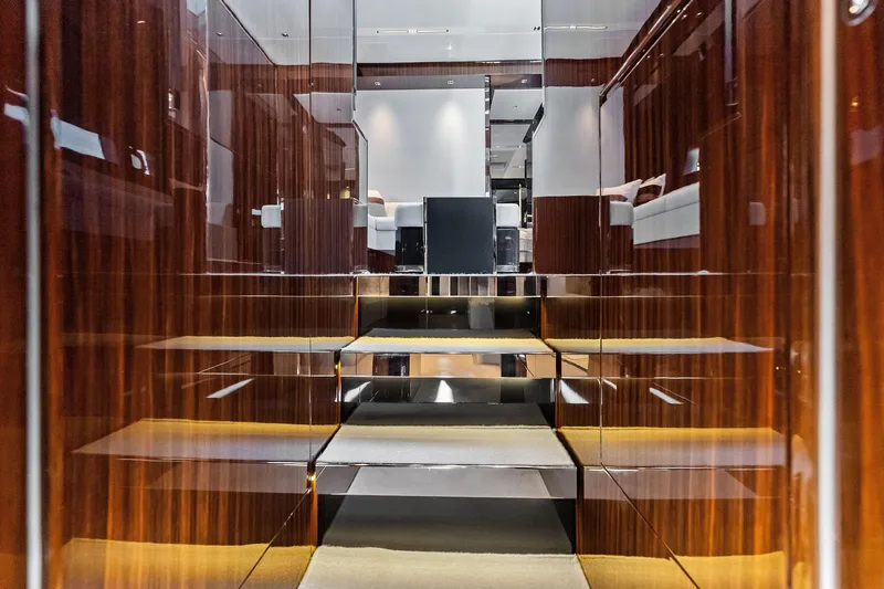 Momentum Yacht Photos Pics Luxurious interior of 2024 Riva 76 PERSEO Super yacht with polished wood finishes.