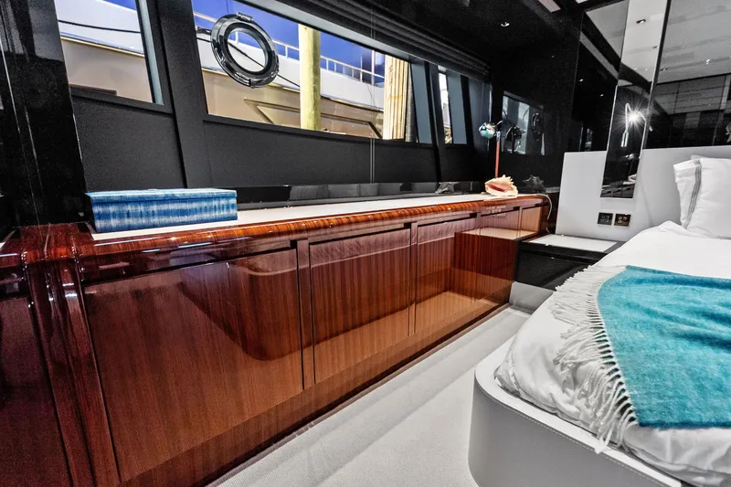 Momentum Yacht Photos Pics Luxurious interior of 2024 Riva 76 PERSEO Super yacht with elegant wood cabinetry.