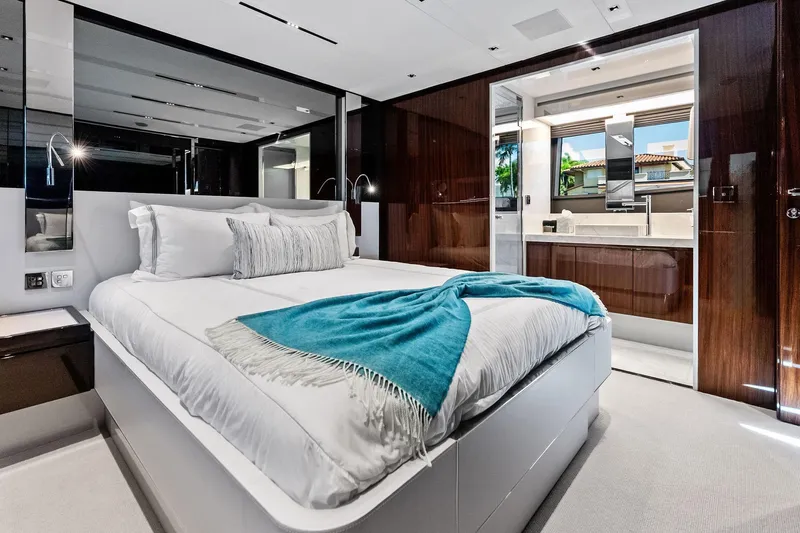 Momentum Yacht Photos Pics Luxurious bedroom interior of 2024 Riva 76 PERSEO Super yacht with elegant decor.