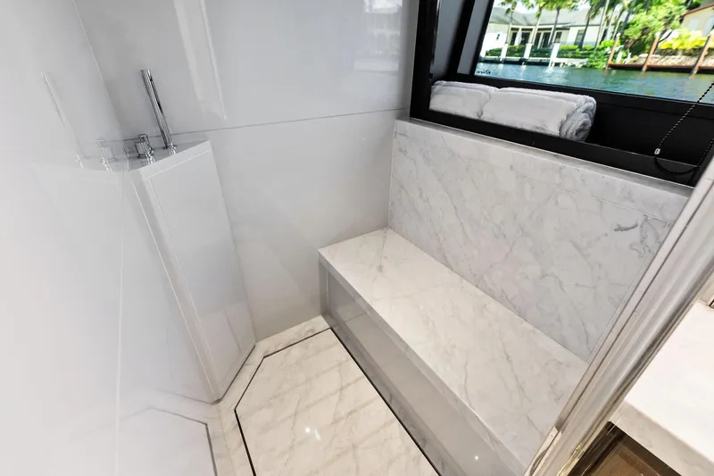 Momentum Yacht Photos Pics Luxurious bathroom interior of 2024 Riva 76 PERSEO Super yacht with marble accents.
