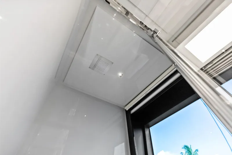 Momentum Yacht Photos Pics Interior view of 2024 Riva 76 PERSEO Super yacht, featuring sleek modern design and skylight.