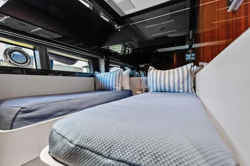 Momentum Yacht Photos Pics Luxurious interior cabin of 2024 Riva 76 PERSEO Super yacht with plush bedding.