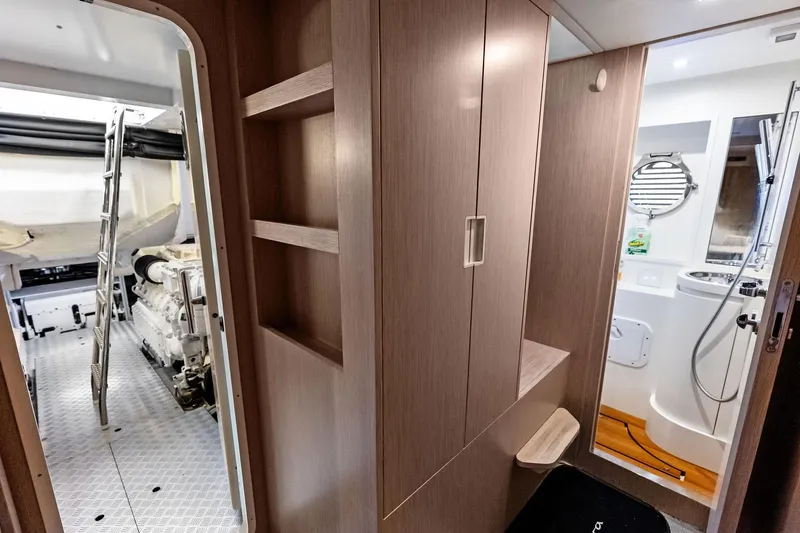 Momentum Yacht Photos Pics Interior of 2024 Riva 76 PERSEO Super yacht, featuring engine room and bathroom.