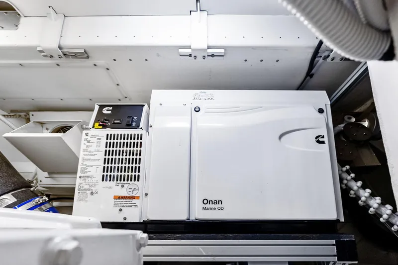 Momentum Yacht Photos Pics Engine room of 2024 Riva 76 PERSEO Super with Onan Marine QD generator.