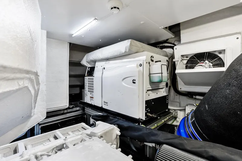 Momentum Yacht Photos Pics Engine room of 2024 Riva 76 PERSEO Super yacht with Onan generator and ventilation system.