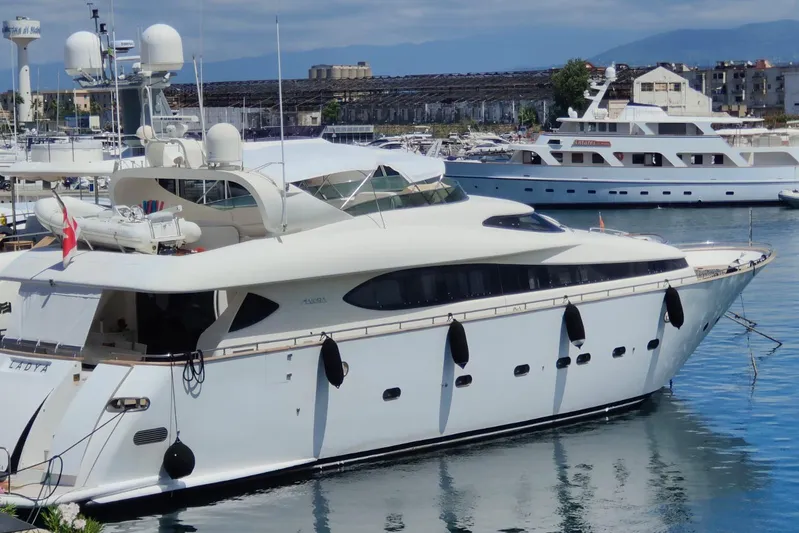 Lady A Yacht Photos Pics Luxurious 2000 Maiora 29 DP yacht docked in a marina, showcasing sleek design.