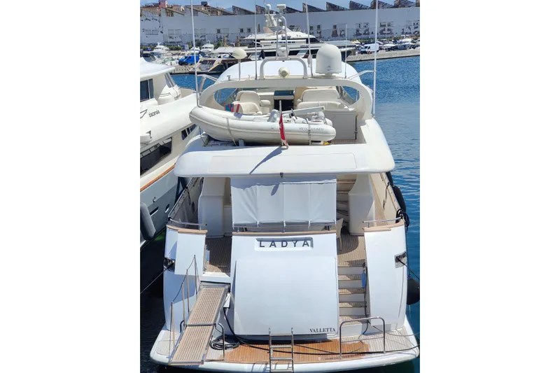 Lady A Yacht Photos Pics Luxury Maiora 29 DP yacht from 2000 docked at marina, rear view.